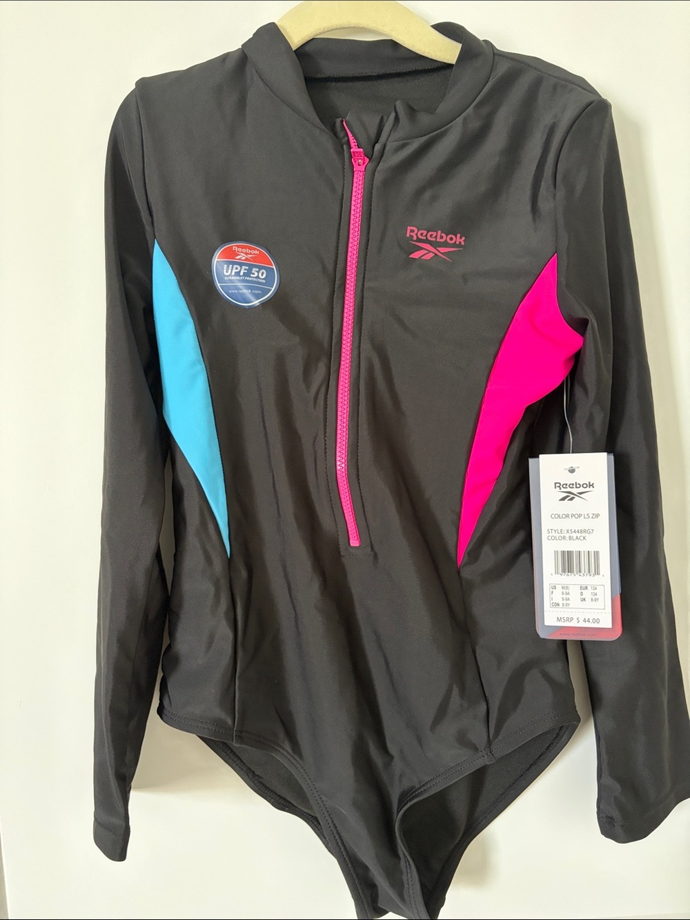 **Never Worn** Reebok Black Long-Sleeve Zip Front Swim Top with Pink & Blue Pane